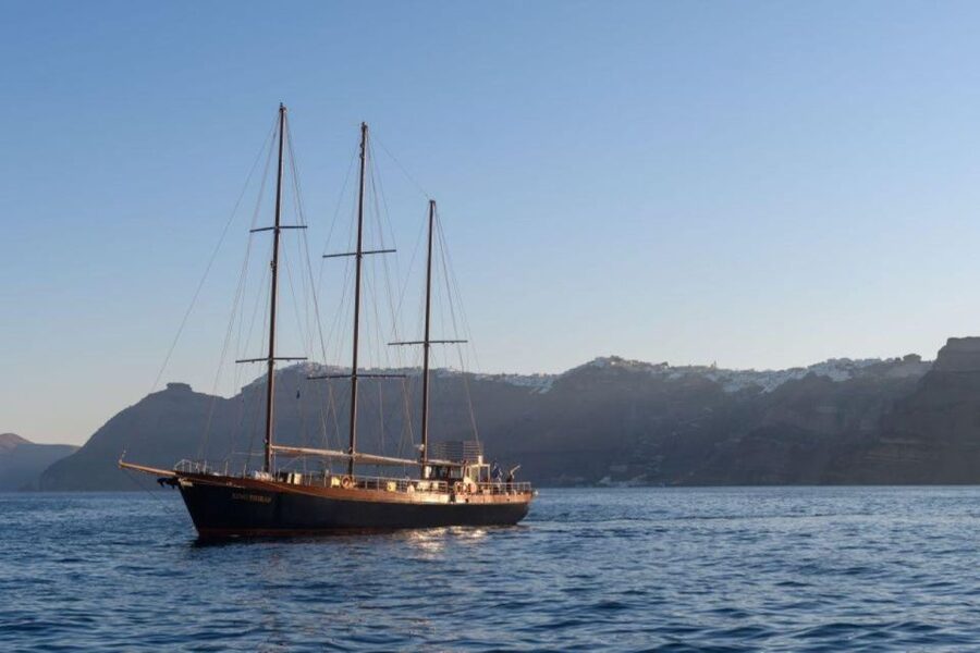 1-Day Boat Trip: Santorini Volcano, Thirassia & Oia Sunset - Sailing below Oia’s cliffs