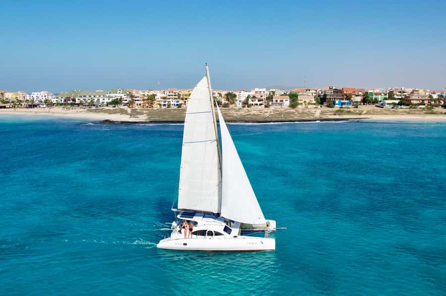 3-hour Catamaran Adventure on the waters of Sal Island - Boarding the catamaran by dinghy