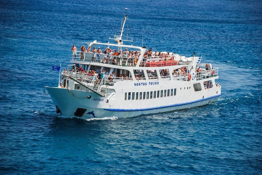 Agios Nikolaos: Boat Trip to Spinalonga with Swim Stop - Language and guiding details