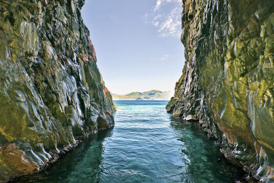 Ajaccio/Porticcio: Scandola Nature Reserve Guided Boat Tour - Capo Rosso adds a final dramatic stop