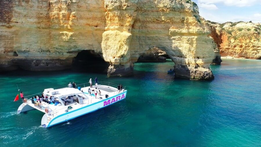 Albufeira: Catamaran Cruise with BBQ & Open Bar on the Beach - Seeing Benagil and the nearby caves