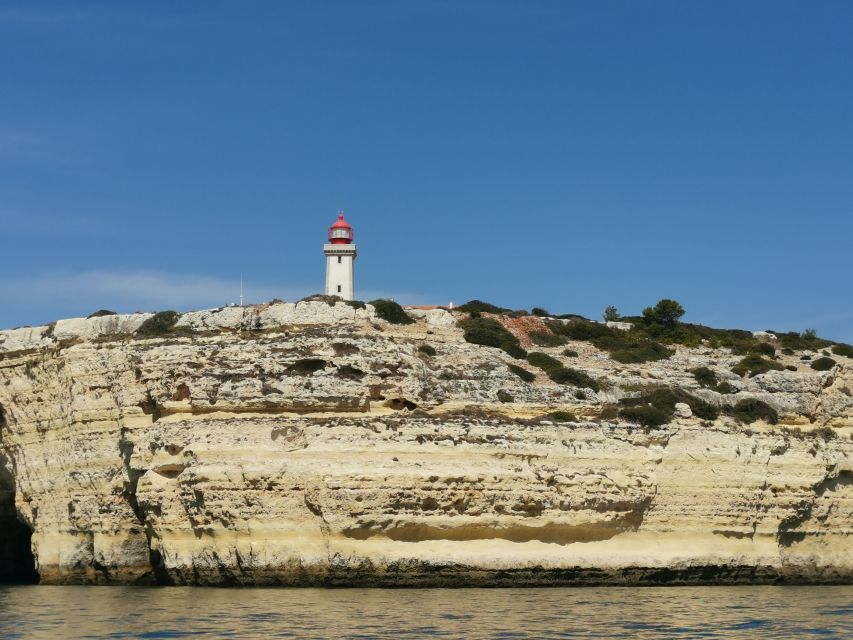 Albufeira: Coastline and Benagil Caves Tour by Catamaran - Comfort, music, drinks, and onboard facilities