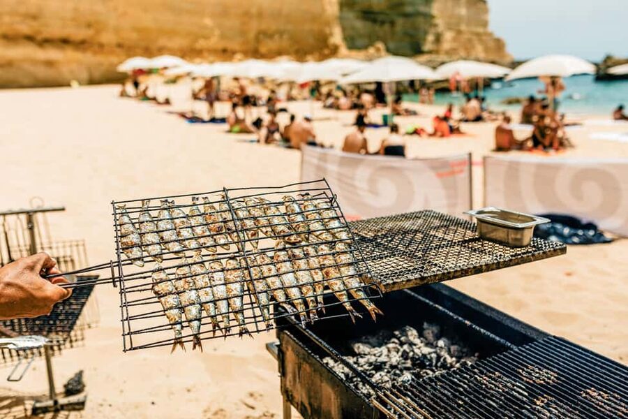 Albufeira: Sightseeing Cruise with Beach BBQ and Open Bar - The dinghy landing at a secluded beach