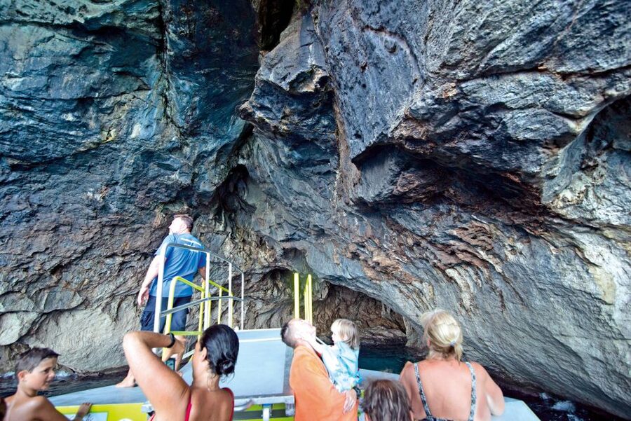 Alcudia: Caves & Coastline Boat Trip w/ Snorkelling - Entering the coastal caves