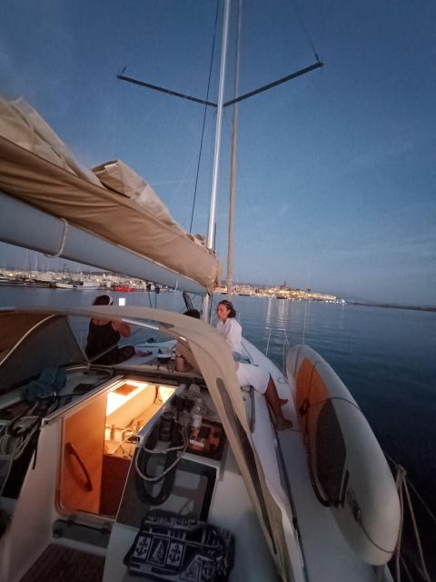 Alghero: Sunset Sailing Aperitif Experience - Stopping at Maddalenetta for the final swim