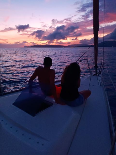 Alghero: Sunset Sailing Aperitif Experience - Sunset views toward Capo Caccia
