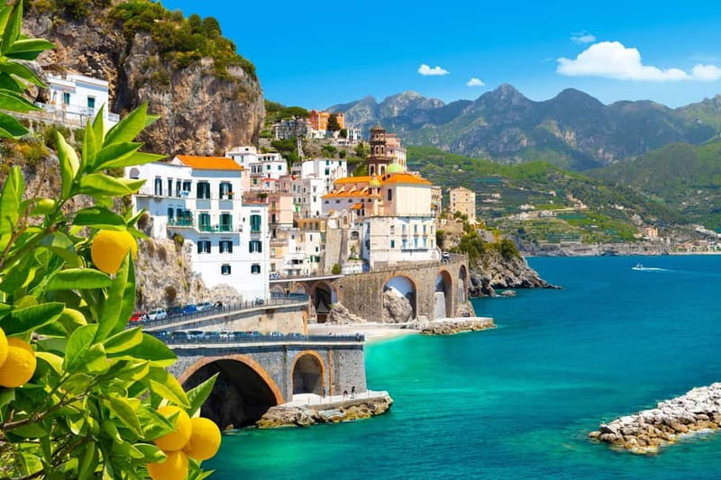 Amalfi: Boat Adventure Caves, Beaches, Snorkeling & Positano - Arriving at Positano from the water