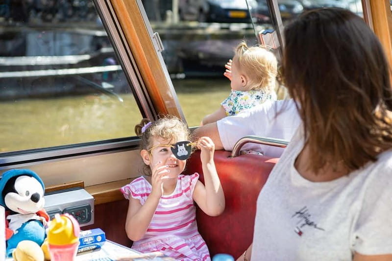 Amsterdam: 75 Minute City Canal Cruise with Audio Guide - Departure points, comfort, and access