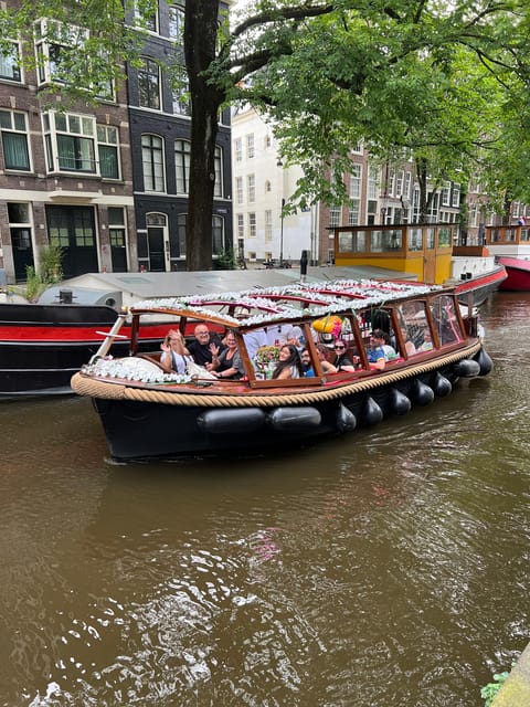 Amsterdam: Boat Tour with Optional Unlimited Drinks - A guide-led ride with plenty of personality
