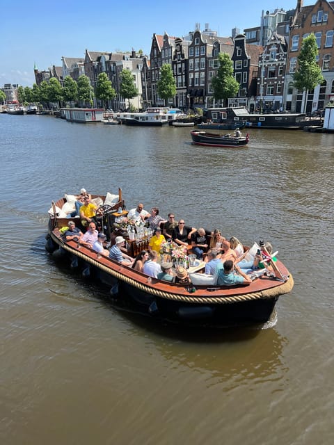 Amsterdam: Boat Tour with Optional Unlimited Drinks - The route from De Oude Kerk to the Amstel