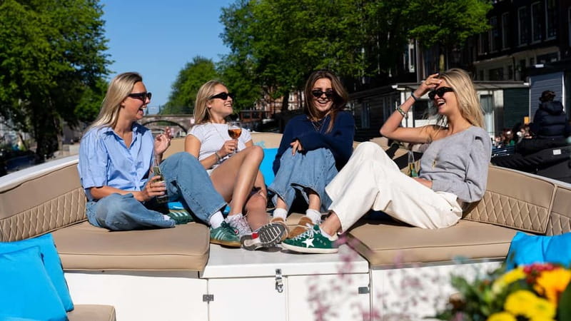 Amsterdam: Canal Cruise in Open Boat with Drink Option - From Carré to Magere Brug