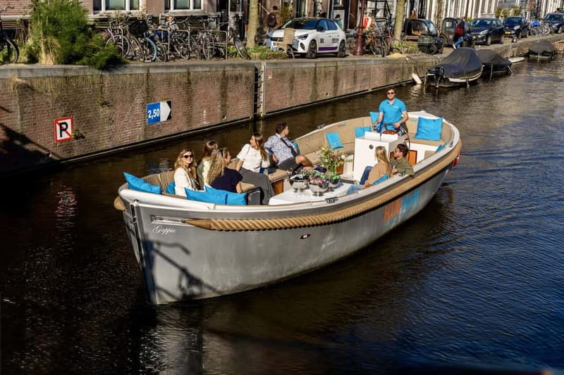 Amsterdam: Canal Cruise in Open Boat with Drink Option - Open boat comfort, drinks, and weather