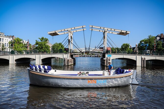 Amsterdam Canal Cruise in Open Boat with Unlimited Drinks Option - Sunset, evening lights, and the best time to go