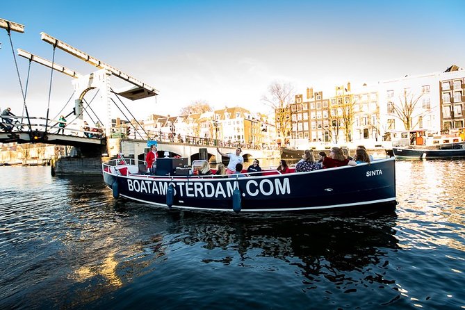 Amsterdam Canal Cruise With Live Guide and Unlimited Drinks - Passing the Anne Frank House
