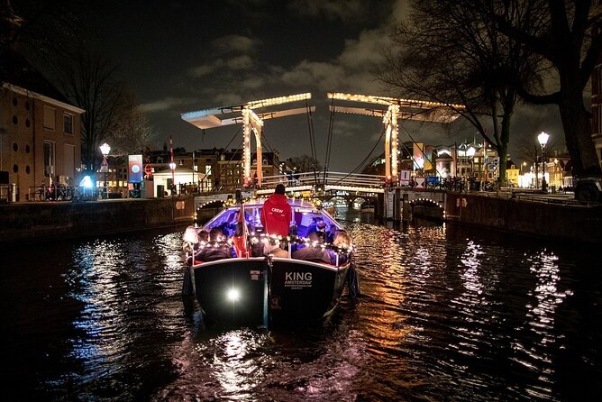Amsterdam Canal Cruise With Live Guide and Unlimited Drinks - Unlimited drinks, coffee, and the onboard atmosphere