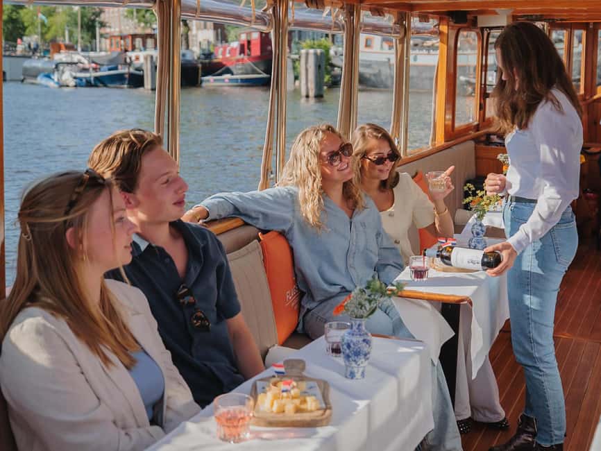 Amsterdam: Classic Saloon Boat Cruise with Cheese & Wine - The Amstel River and the Skinny Bridge