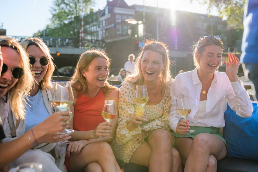 Amsterdam: Covered Canal Booze Cruise with Unlimited Drinks - Oudeschans and the older canal belt