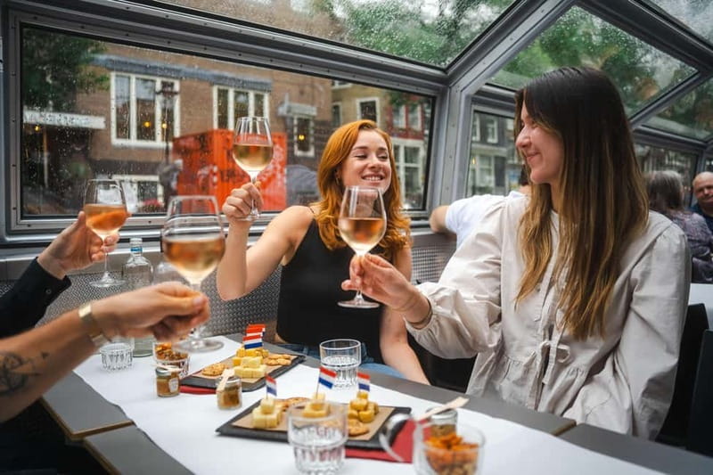 Amsterdam: Cozy Cheese & Wine Cruise Tasting Experience - Settling into the heated cabin