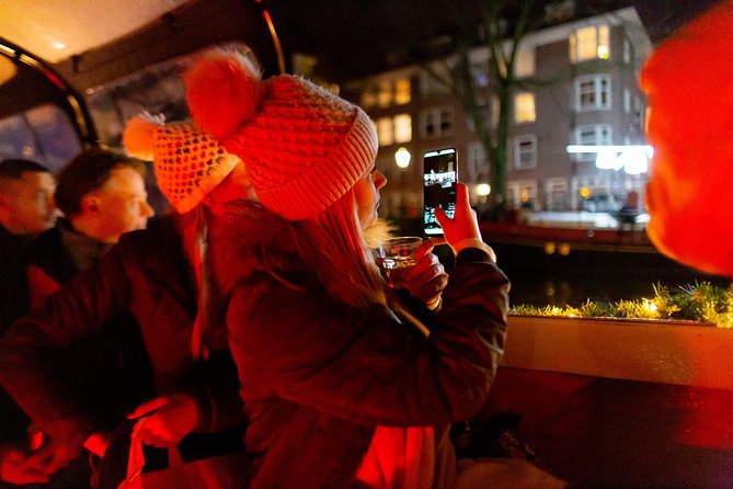 Amsterdam Evening Canal Cruise with Live Guide and Onboard Bar - Cancellation and meeting advice