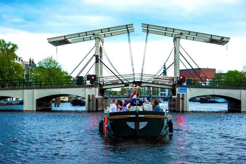 Amsterdam Evening (Sunset) Canal Cruise w/ optional drinks - Small boat comfort and changing weather