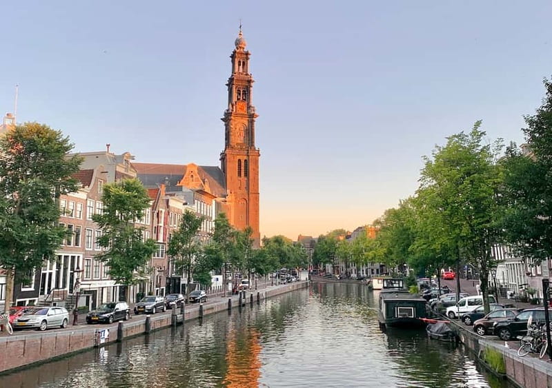 Amsterdam: German Canal Cruise with Unlimited Drinks Option - Boarding beside Sea Palace