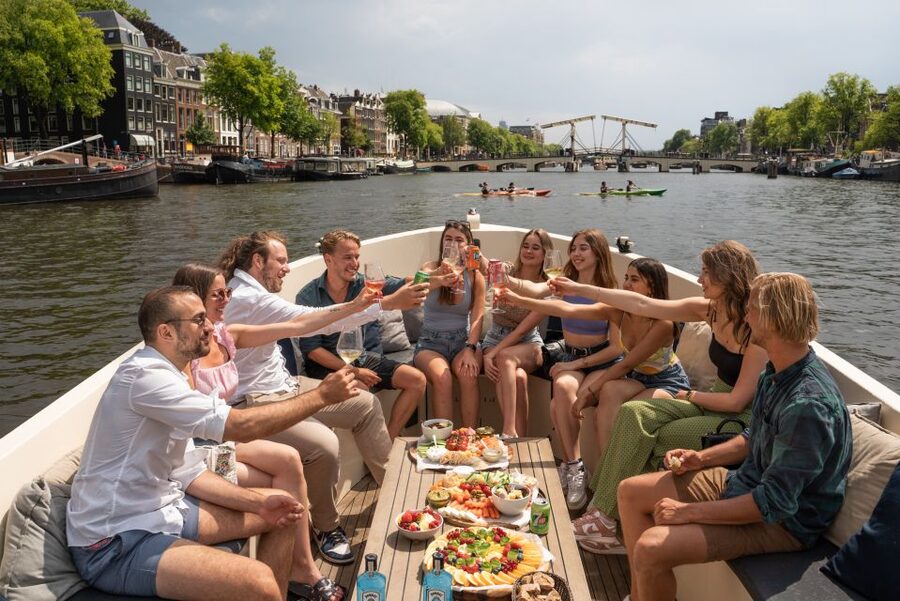 Amsterdam: German Guided Canal Cruise with on Board Bar - A quiet start from the Amstel near Rembrandtplein