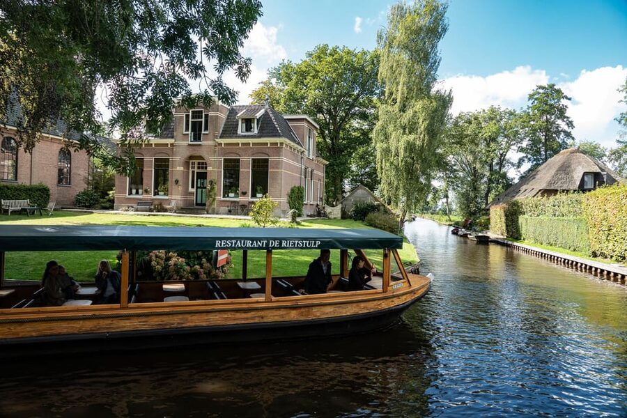Amsterdam: Giethoorn Tour Scenic Cruise, Cheese & Free Time - The two-hour coach ride to Giethoorn