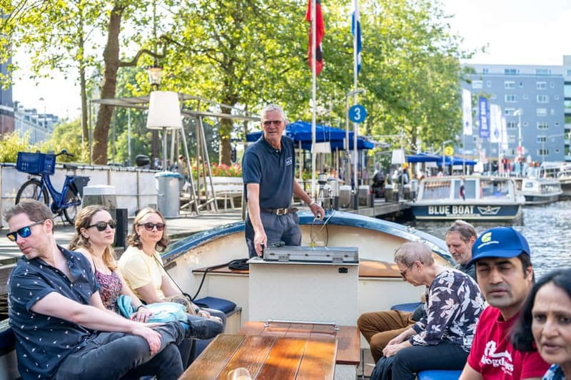 Amsterdam: Guided City Highlights Open Boat Canal Cruise - From the Hard Rock Cafe to the Amsterdam center