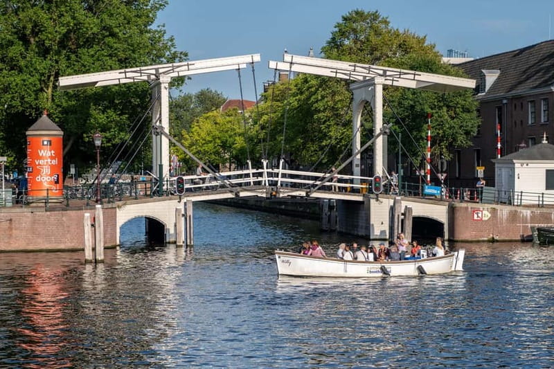 Amsterdam: Guided City Highlights Open Boat Canal Cruise - Westerkerk, Prinsengracht, and the Anne Frank House area