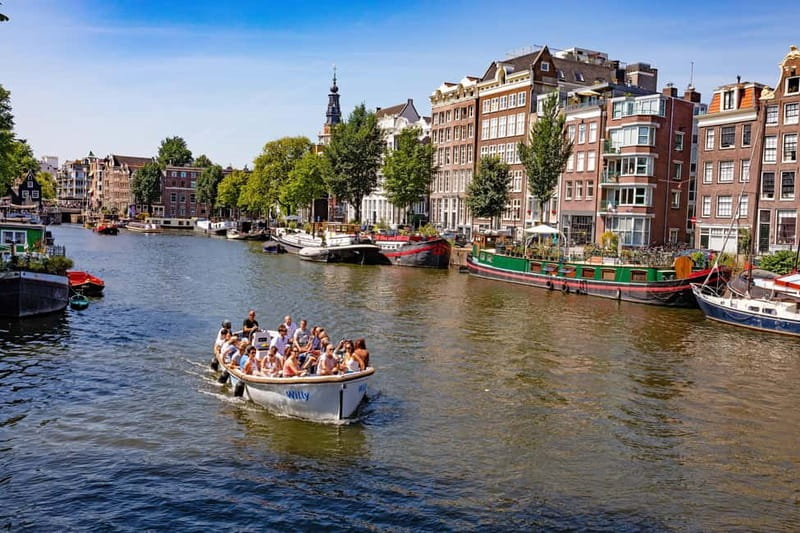 Amsterdam: Guided City Highlights Open Boat Canal Cruise - Across the IJ toward A’DAM Lookout and NEMO
