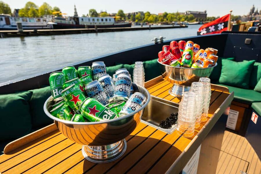 Amsterdam: Guided Open Boat Cruise Unlimited Drinks Option - Finding the dock at Amsterdam Centraal