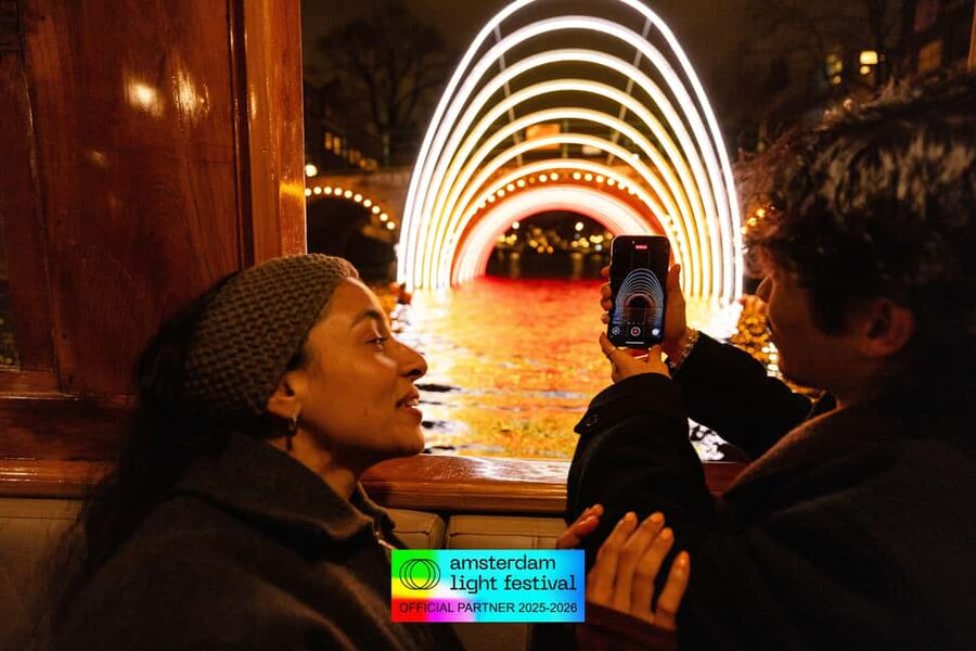 Amsterdam: Light Festival Cruise + Stroopwafel & Hot Choco - NEMO, Waterlooplein, and the first canal views