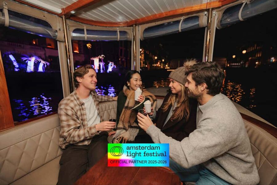 Amsterdam: Light Festival Heated Cruise + Hot Choco + Snack - Haarlemmersluis and the city’s working-waterfront feel