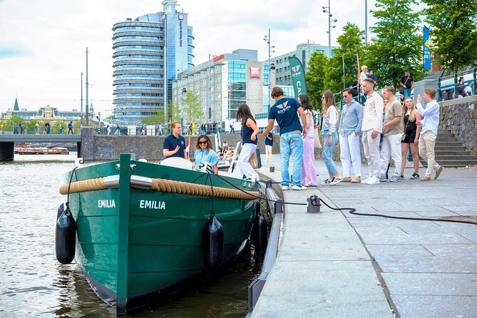 Amsterdam Newest Canal Cruise with local guide and small group - Oude Kerk, De Wallen, and Zeedijk
