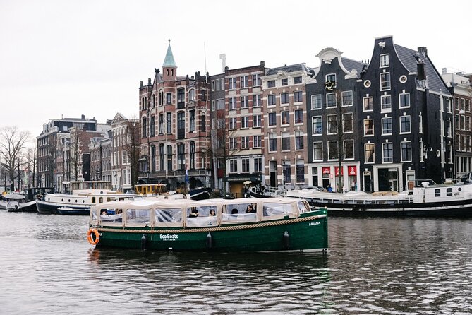 Amsterdam Newest Canal Cruise with local guide and small group - Saint Nicholas Basilica and Amsterdam’s maritime identity