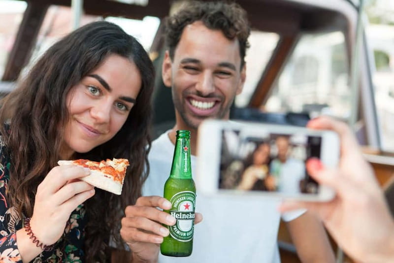 Amsterdam: Original Pizza Dinner Cruise + Unlimited Drinks - Magere Brug, the Dancing Houses, and NEMO