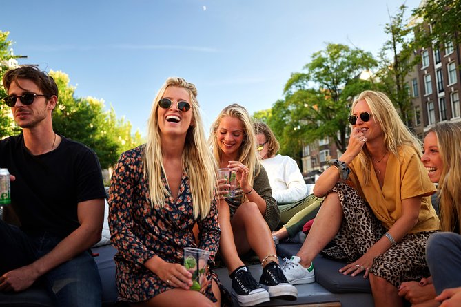 Amsterdam: Saloon Boat Cruise + Unlimited Drinks & Bite option - The Drunken Houses and Amsterdam’s crooked charm