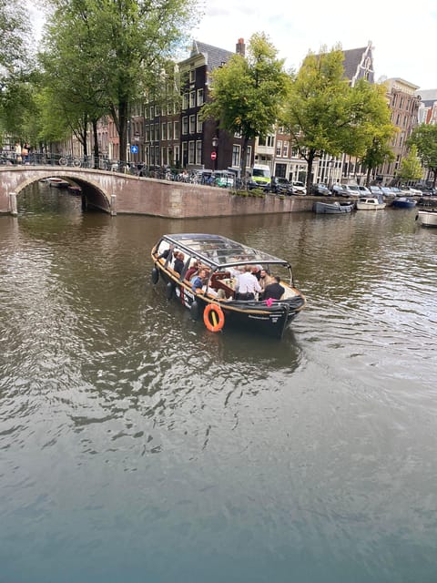 Amsterdam Small Group Canal Cruise inc Snacks/Drinks Winter - Sunset, canal lights, and the winter atmosphere