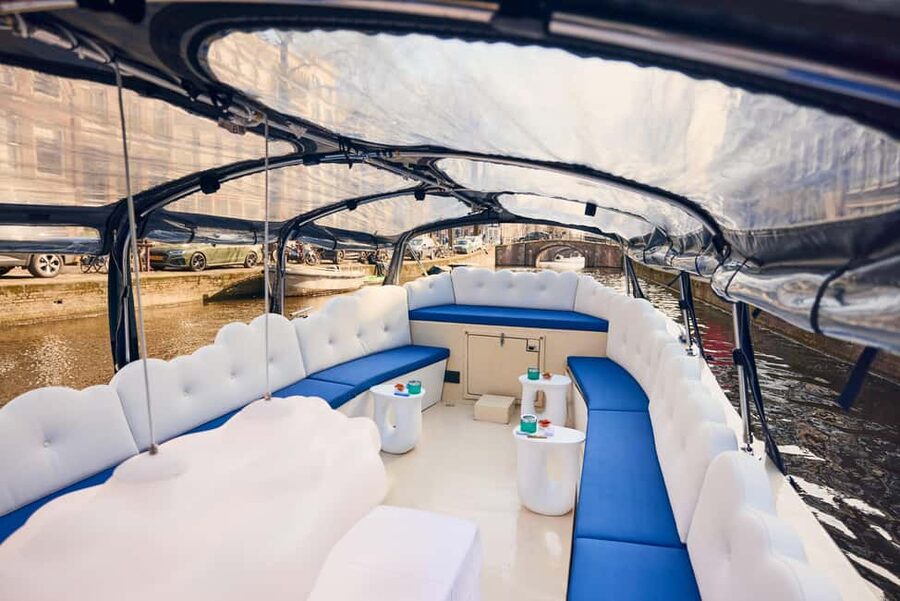 Amsterdam: Smoke & Cruise on covered Cannabis Boat With Bar - The guides make the short ride worthwhile