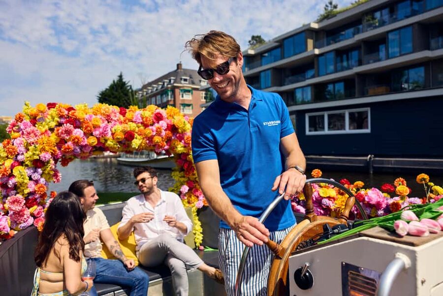Amsterdam: The Original Flower Boat with Local Guide and Bar - Meeting the crew on Oudezijds Voorburgwal