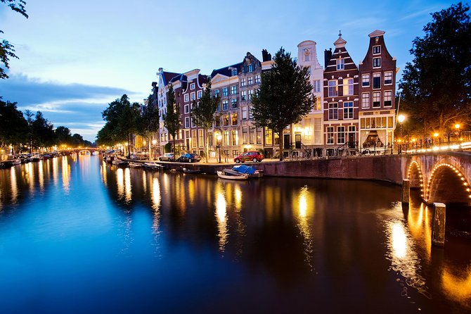 Amsterdam: Wine and Cheese Evening Cruise - Under the illuminated bridges