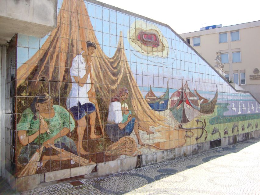 Aveiro: Walking Tour, Boat Cruise, Sweets & Church Entrance - Cruising the canals aboard a Moliceiro