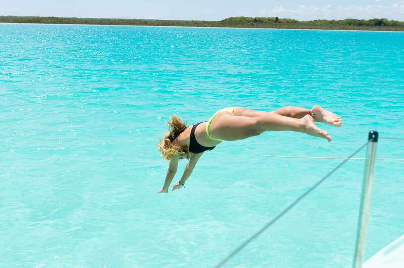 Bacalar: Group Sailing Trip with Swimming and Drinks - Passing Cenote Esmeralda