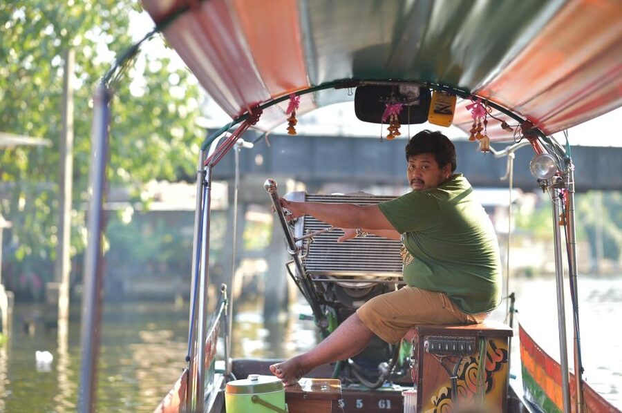 Bangkok: Canal Boat Tour, Big Buddha & Artist's House - Boarding the longtail boat in a group of eight