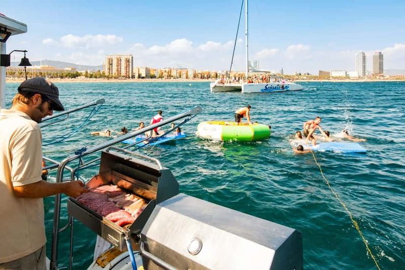 Barcelona: Catamaran Party Cruise with BBQ Meal - Badalona swimming stop: fun, but not long