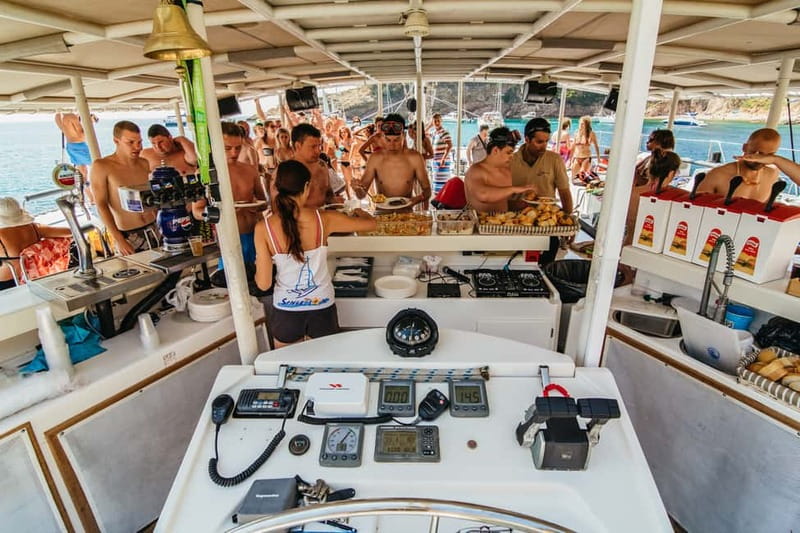 Barcelona: Catamaran Party Cruise with BBQ Meal - Music, dancing, and the return cruise