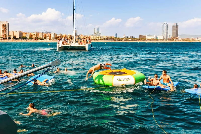 Barcelona: Catamaran Party Cruise with BBQ Meal - The first hour: Barcelona from the water