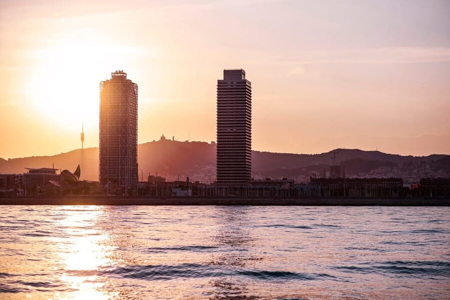 Barcelona: Daytime or Sunset Catamaran Cruise with Music - The sunset cruise: music, photos, and extra time