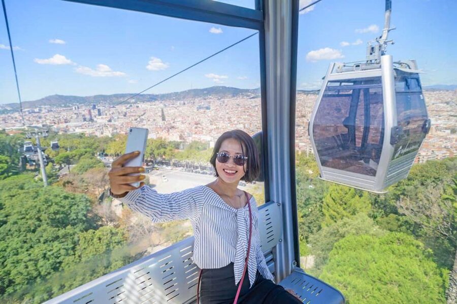 Barcelona: E-Bike Tour with Montjuic Cable Car & Boat Ride - Montjuïc Cable Car views over the city