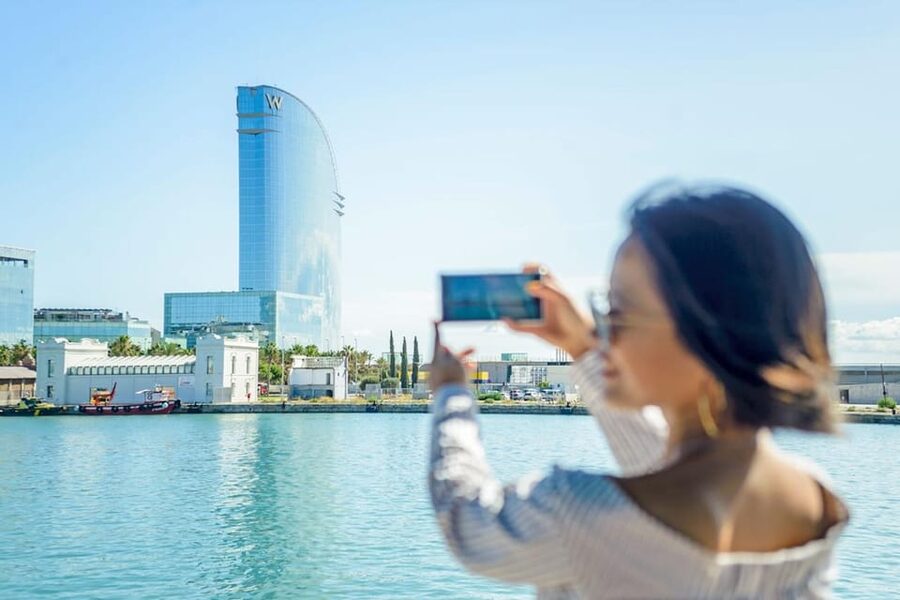 Barcelona: E-Bike Tour with Montjuic Cable Car & Boat Ride - Starting in El Raval and riding Paral·lel Avenue